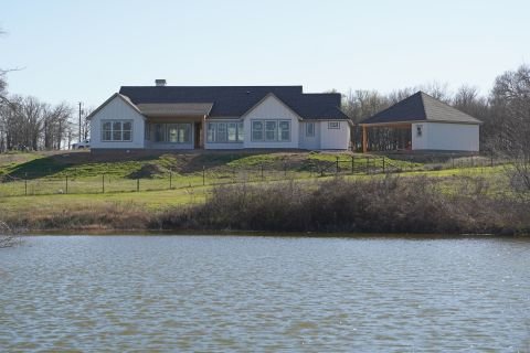 House Rear With Pond